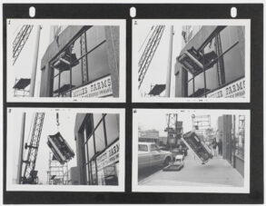 Black-and-white sequence of four photos showing a construction crane lifting and positioning a large rectangular object—possibly a container or equipment—against the side of a building along a city street, with pedestrians and parked cars visible nearby.