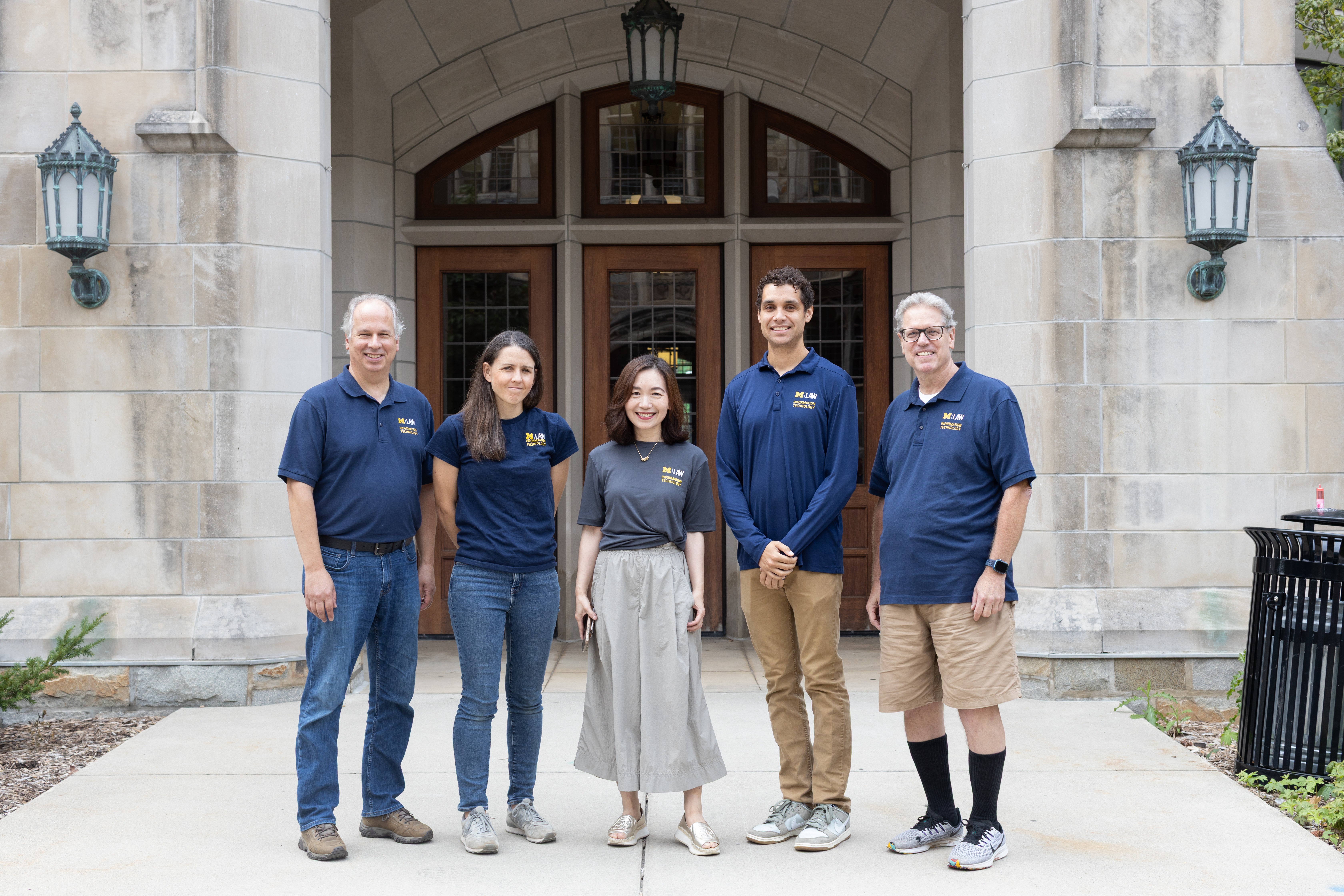 The Law IT software development team, from left to right: Rich Savitski, Callie Masten, Law IT Director Huan Yan, Travis Frasier, Kevin Ross. We’re standing just outside Jeffries Hall, home to the Law IT offices.